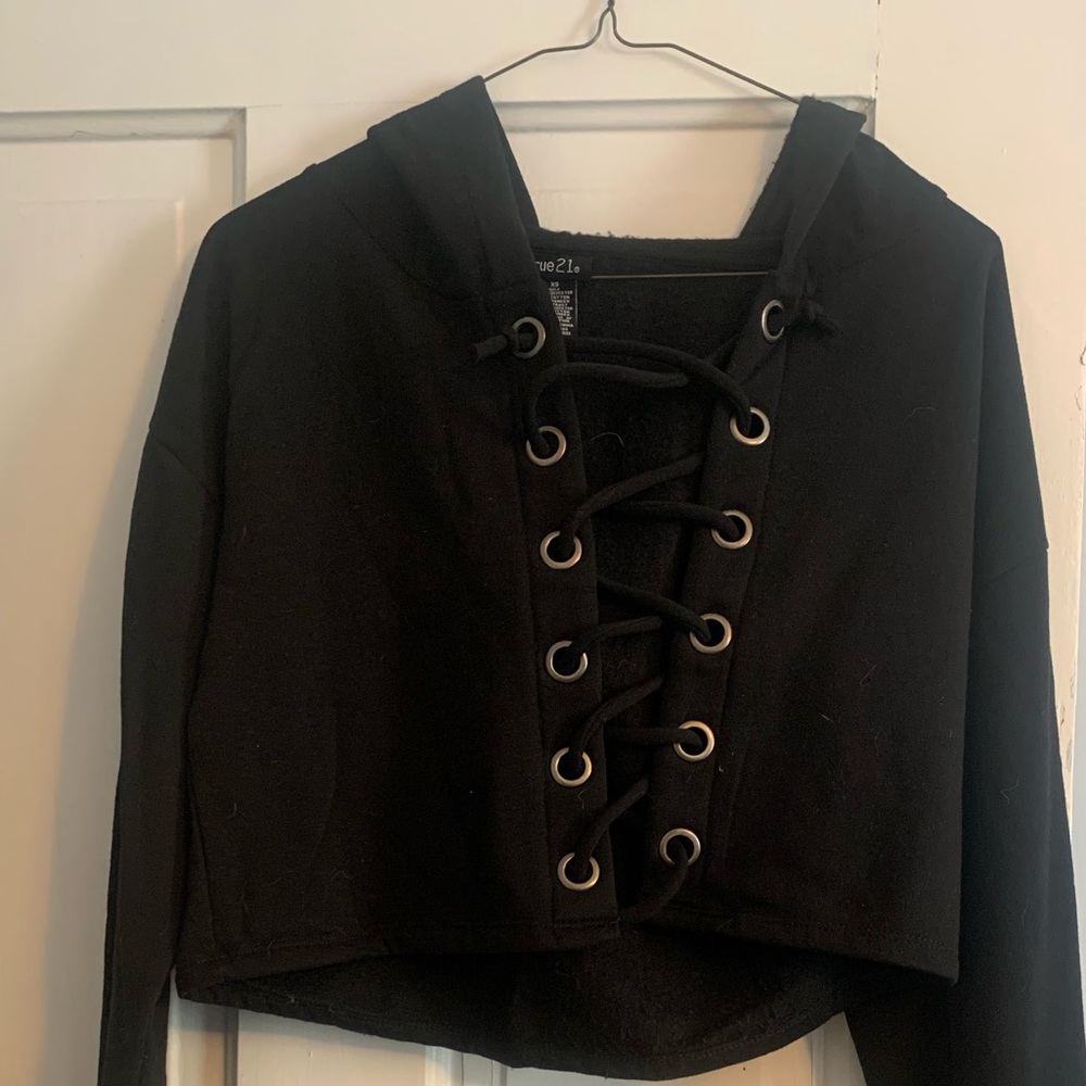Black criss-cross, semi- crop tied hoodie. Never worn.